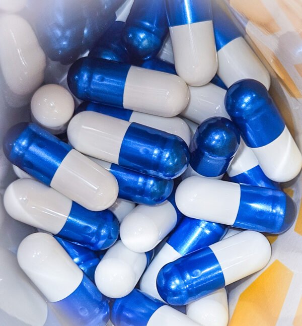 Drops of Olympus 45mg MIT Extract Capsules